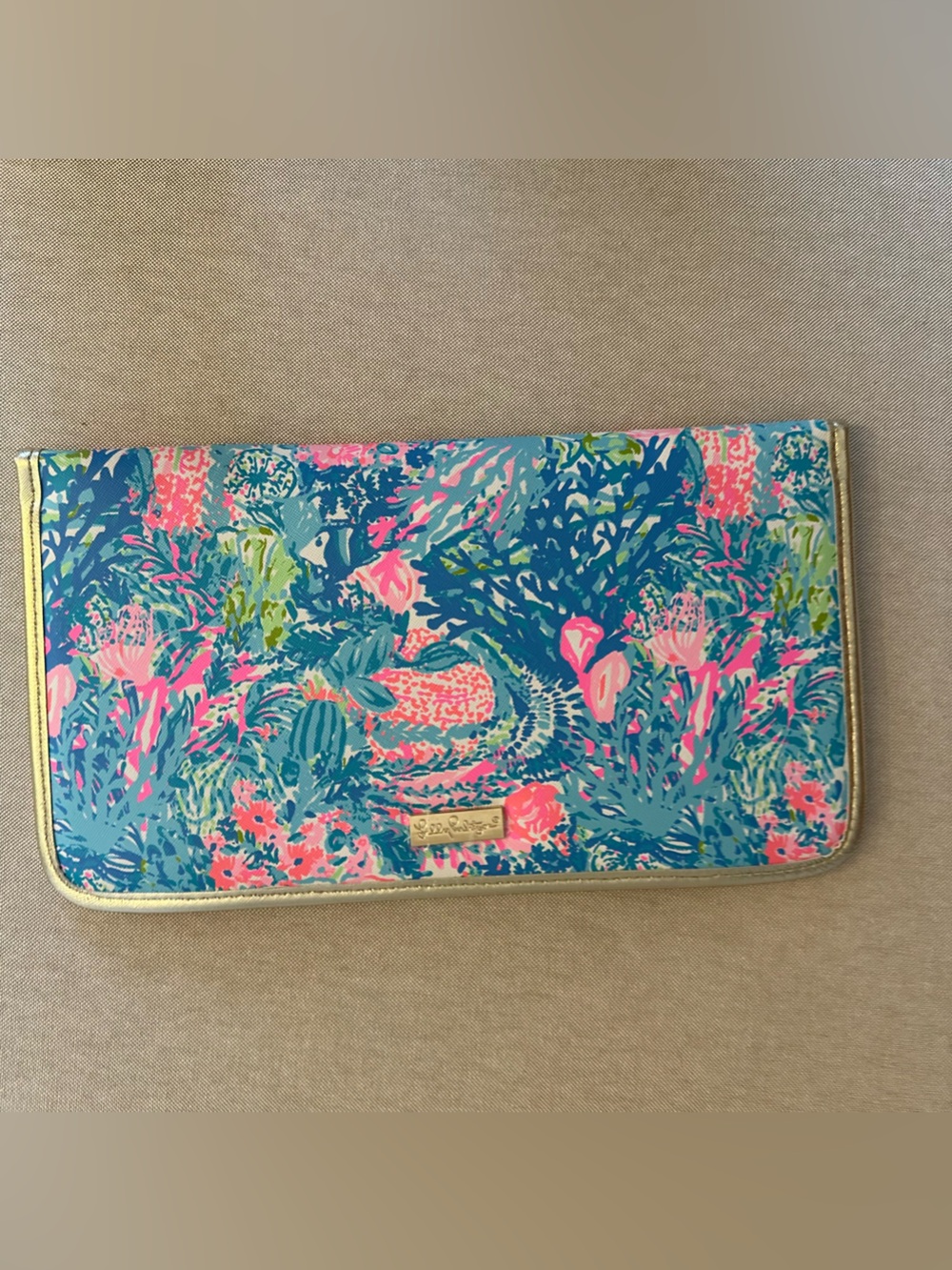 Lilly Pulitzer travel organizer wallet in the "Fished My Wish" print